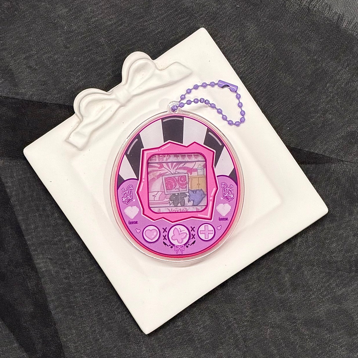 Vax Lenticular Tamagotchi