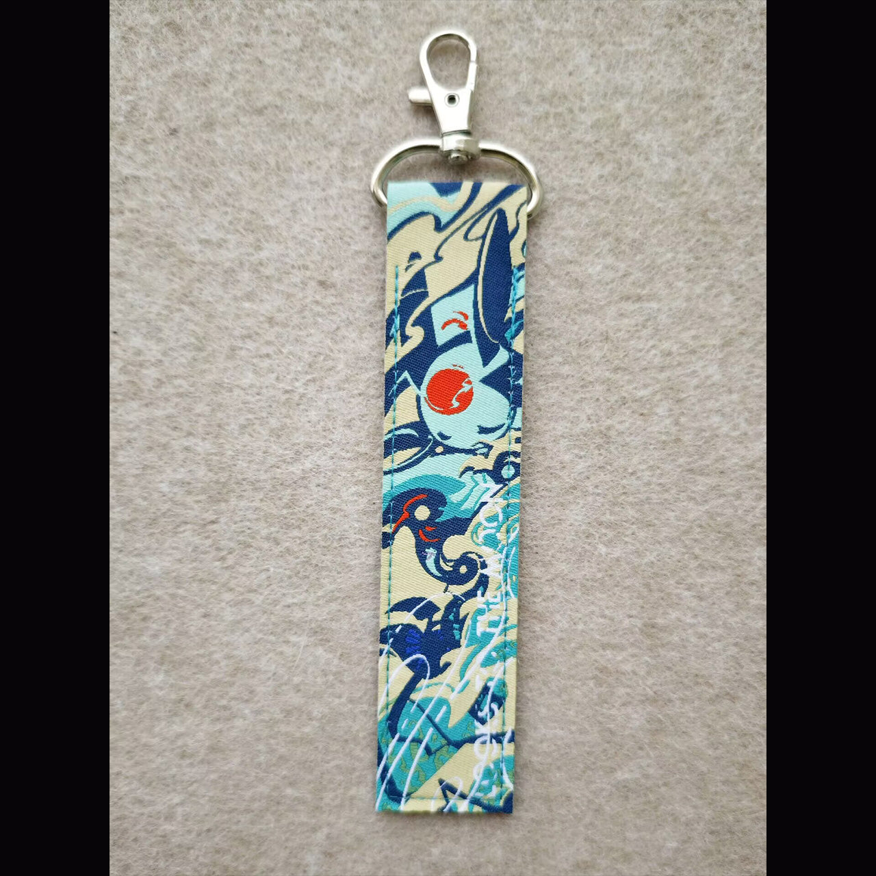 Iterators Double-Sided Woven Label Keychain