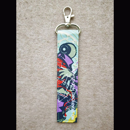Iterators Double-Sided Woven Label Keychain
